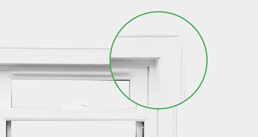 A single hung window with a green arrow on it.